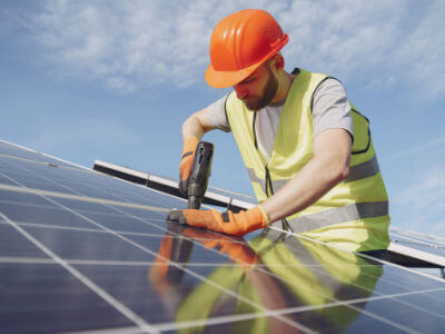 Solar panels in field with sunshine